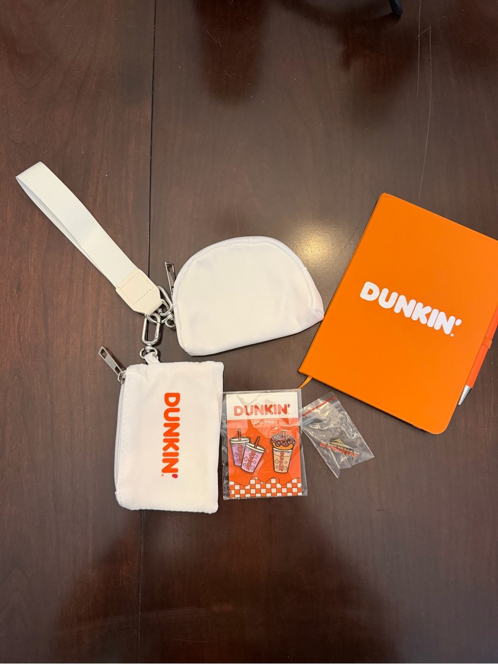 New Set of 4 Dunkin' Swag Items.  Notebook, enamel pins and Key Ring Pouches.